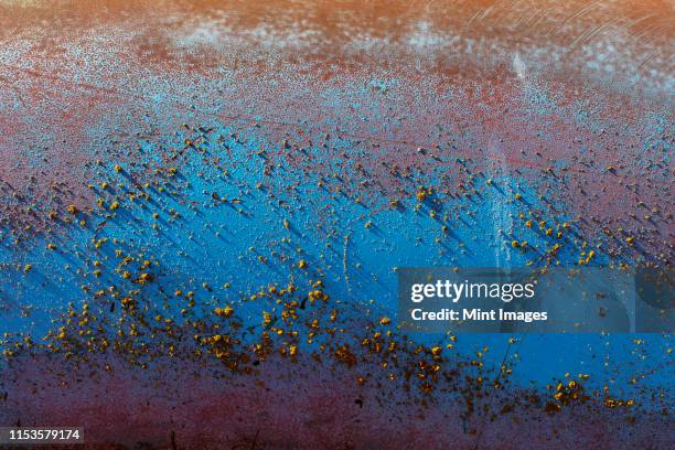 detail of peeling blue paint and rust - metal scratches stock pictures, royalty-free photos & images