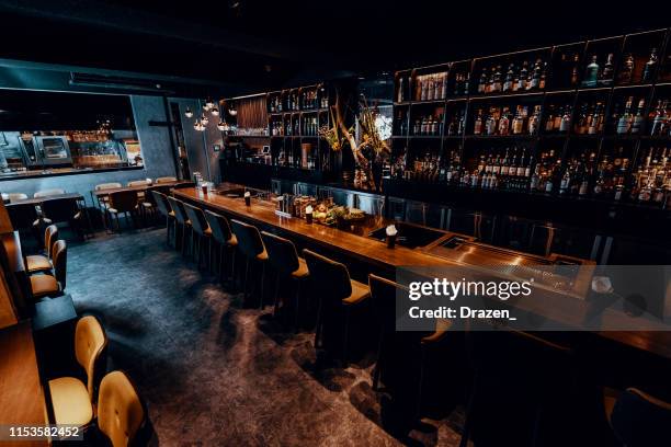 modern empty night bar waiting for guests. - lounge bar restaurant stock pictures, royalty-free photos & images