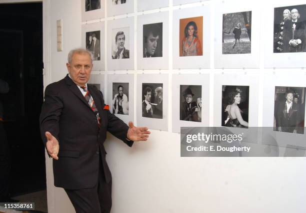 Ron Galella with some of his photos during Ron Galella Exhibit - "Photography with the Paparazzi Approach" in Amsterdam at Gallery Wouter van Leeuwen...