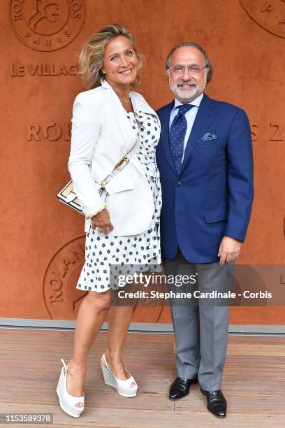 Olivier Dassault and his wife Natacha Nikolajevic attend the 2019 French Tennis Open - Day Eight at Roland Garros on June 03, 2019 in Paris, France.