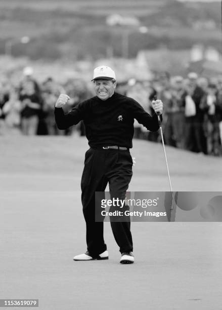 Gary Player of South Africa celebrates holing out on the second playoff hole to win the Senior British Open Championship on 20 July 1997 at the Royal...