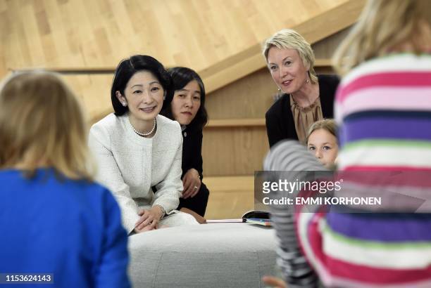 Crown Princess Kiko of Japan visits the Oodi Central Library with Children and Youth Service Manager of Helsinki Central Library Oodi Collection...