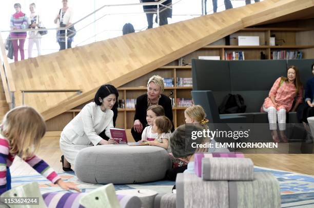 Crown Princess Kiko of Japan visits the Oodi Central Library with Children and Youth Service Manager of Helsinki Central Library Oodi Collection...