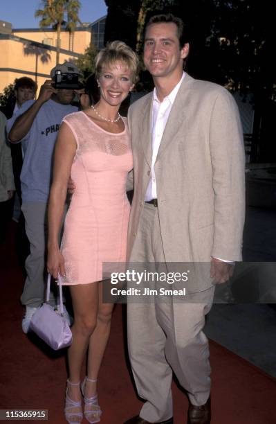 Lauren Holly and Jim Carrey during "The Nutty Professor" Los Angeles Benefit Premiere at Universal Studios Amphiteatre in Universal City, California,...