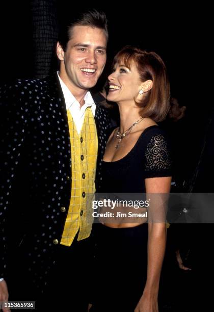 Jim Carrey and Lauren Holly during "The Mask" Los Angeles Premiere at Academy of Motion Picture Theater in Beverly Hills, California, United States.