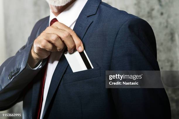 credit card in pocket - man hands in pockets stock pictures, royalty-free photos & images