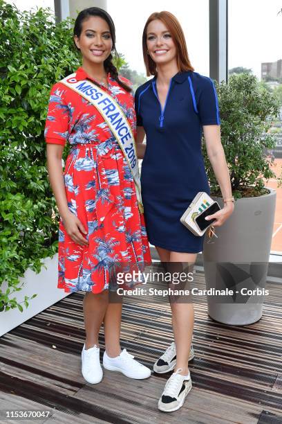 Miss France 2019 Vaimalama Chaves and Miss France 2018 Maeva Coucke attend the 2019 French Tennis Open - Day Ten at Roland Garros on June 04, 2019 in...