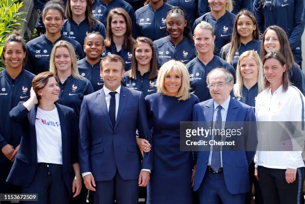 French President Emmanuel Macron , his wife Brigitte Macron , French Sport Minister Roxana Maracineau , France's National Women's Soccer Team's head...