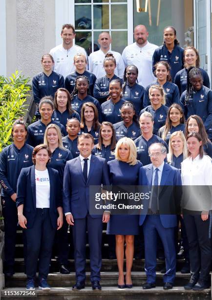 French President Emmanuel Macron , his wife Brigitte Macron , French Sport Minister Roxana Maracineau , France's National Women's Soccer Team's head...