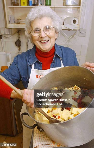 Etta Richardson in Llansteffan, mixes the ingredients needed to bake the cake for the upcoming Royal Wedding. A grandmother who impressed the Prince...