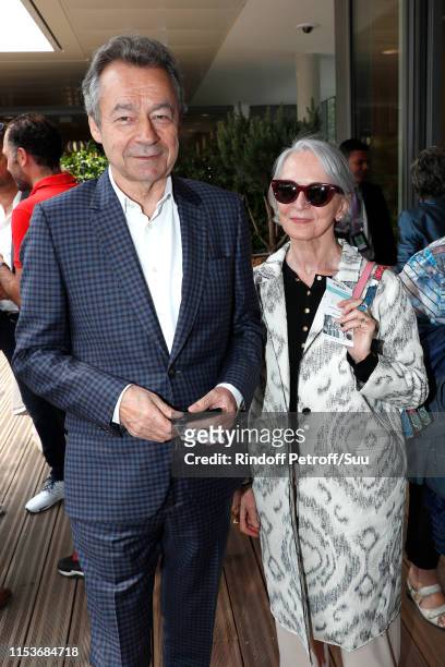 Michel Denisot and his wife Martine Patier attend the 2019 French Tennis Open - Day Ten at Roland Garros on June 04, 2019 in Paris, France.