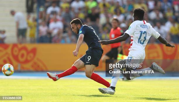 Amine Gouiri of France scores his team's first goal during the 2019 FIFA U-20 World Cup Round of 16 match between France and USA at Bydgoszcz Stadium...