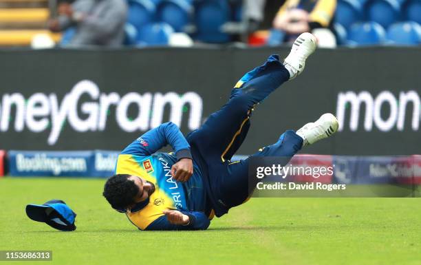 Thisara Perera of Sri Lanka catches Hazratullah Zazai during the Group Stage match of the ICC Cricket World Cup 2019 between Afghanistan and Sri...