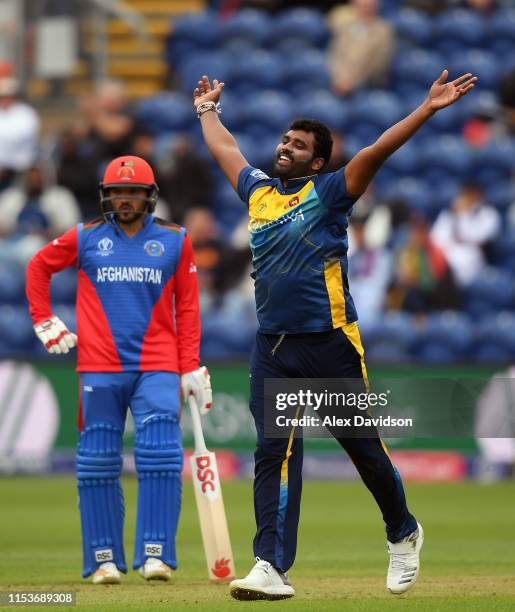 Thisara Perera of Sri Lanka celebrates taking the wicket of Mohammad Nabi of Afghanistan during the Group Stage match of the ICC Cricket World Cup...