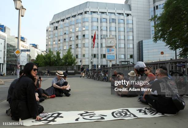 Protesters demonstrate in memory of the victims of the Tienanmen Square massacre on its 30th anniversary, near the Chinese embassy on June 04, 2019...