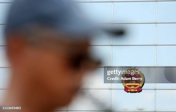 Chinese clarinetist performs Chinese music as protesters demonstrate in memory of the victims of the Tienanmen Square massacre on its 30th...