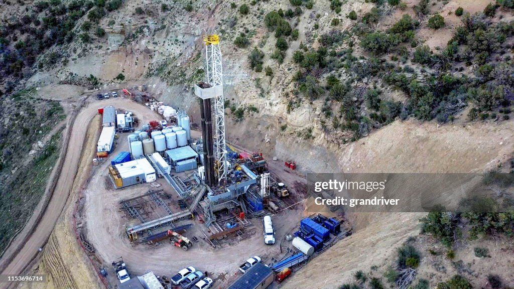 An Aerial View Of A Fracking Drill Rig On The Side Of A Mountain In ...