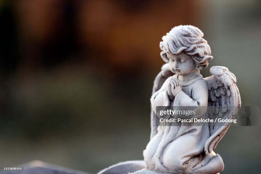 Angel statue in winter. Cemetery. Lundamo. Norway.