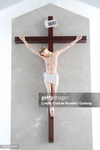 crucifix in a church. jesus on the cross. vung tau. vietnam. - tau cross stock pictures, royalty-free photos & images