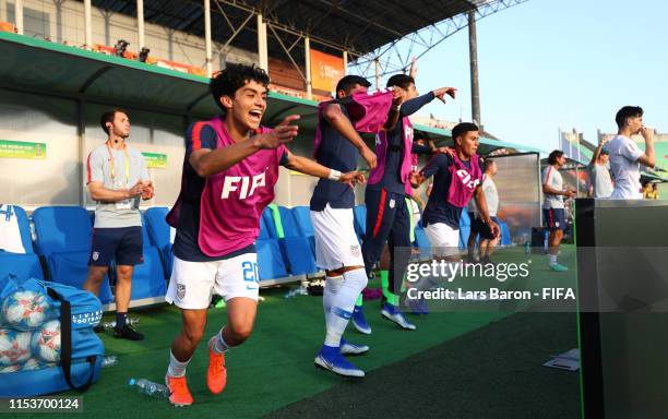 Richard Ledezma of the United States and team mates celebrate victory after the 2019 FIFA U-20 World Cup Round of 16 match between France and USA at...