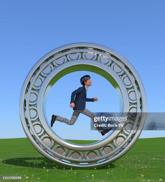 businessman running inside huge ball bearing - running gear stock pictures, royalty-free photos & images