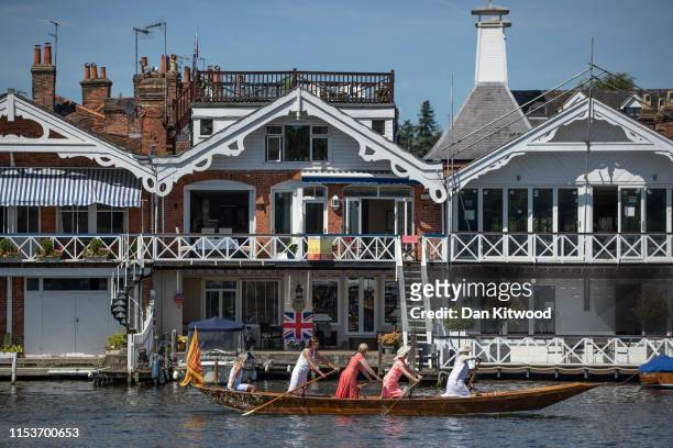 Members of the public row down the river on day two of the Henley Royal Regatta on July 4, 2019 in Henley-on-Thames, England. This year is the events...