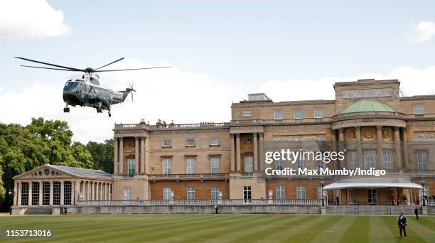 Marine One, the United States Marine Corps Helicopter, carrying U.S. President Donald Trump and Melania Trump comes in to land in the garden of...