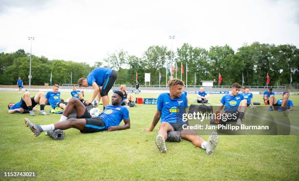 Jordan Torunarigha and Sidney Friede of Hertha BSC warm up during the sports training camp on July 4, 2019 in Neuruppin, Germany.