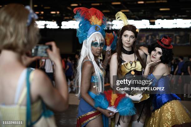 Cosplay participants pose for a picture during the 2019 Japan Expo exhibition in Villepinte, near Paris, on July 4, 2019. - Japan Expo, the largest...