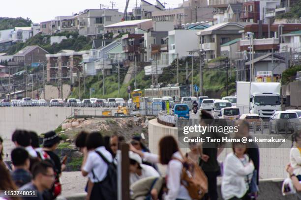 traffic jam on the coast road in japan - kamakura city stock pictures, royalty-free photos & images