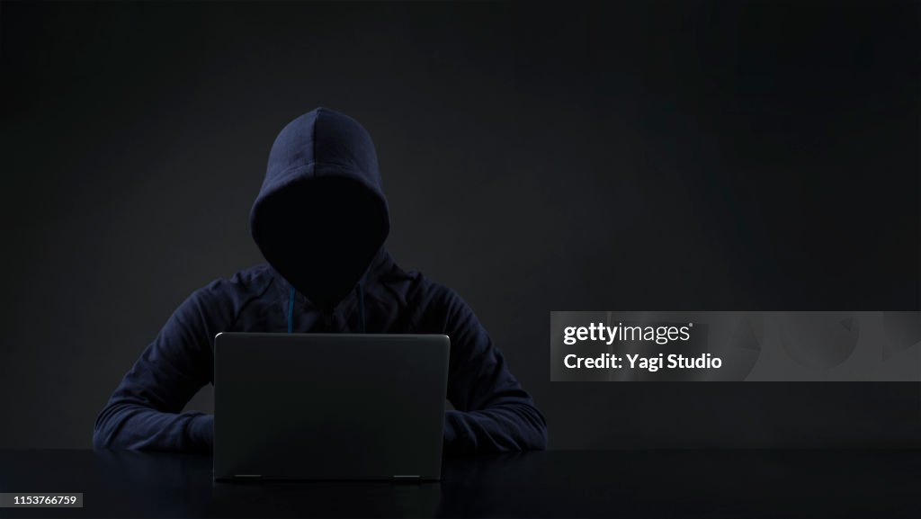 Hacker in front of computer