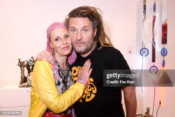 Actress Florence Thomassin and her brother Europe 1 journalist Olivier Delacroix attend "Arnaud Giovaninetti, Soleil Noir" by Caroline Constant book...