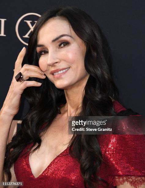 Famke Janssen arrives at the Premiere Of 20th Century Fox's "Dark Phoenix" at TCL Chinese Theatre on June 04, 2019 in Hollywood, California.