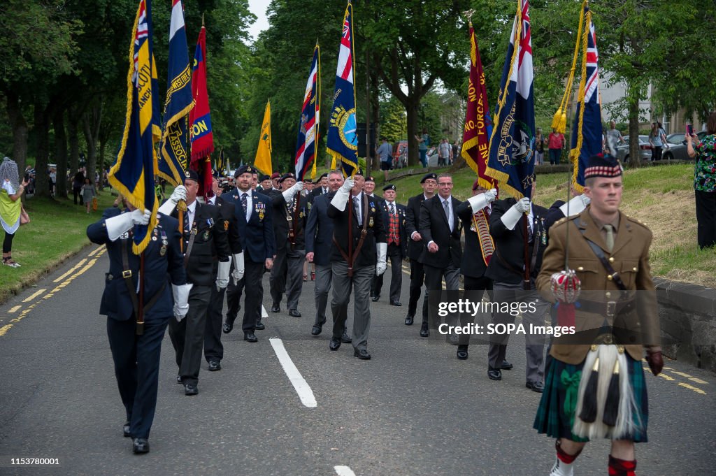 Veterans march on  the street of Stirling during the event.