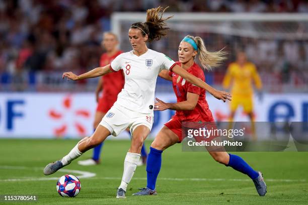 Julie Ertz of United States and Jill Scott of England competes for the ball during the 2019 FIFA Women's World Cup France Semi Final match between...
