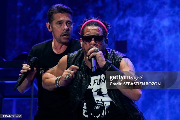 French singers Joey Starr and Kool Shen from the French band NTM perform on stage during the 31st Eurockeennes rock music festival in Belfort,...