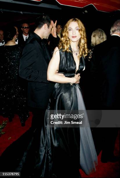 Christopher Ciccone and Madonna during The 70th Annual Academy Awards - Red Carpet at Shrine Auditorium in Los Angeles, California, United States.