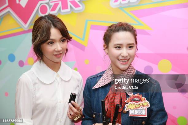 Singer/actress Fiona Sit and Laurinda Ho Chiu-lin, daughter of SJM Holdings founder Stanley Ho, attend the shooting of a TVB's variety show on June...