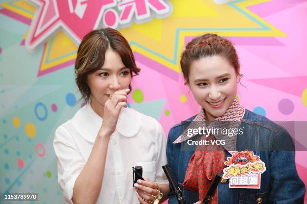 Singer/actress Fiona Sit and Laurinda Ho Chiu-lin, daughter of SJM Holdings founder Stanley Ho, attend the shooting of a TVB's variety show on June...