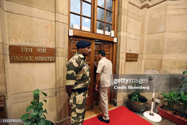 Soldier stands guard in the corridors of the Secretariat Building at South Block in New Delhi, India, on Thursday, July 4, 2019. Newly appointed...