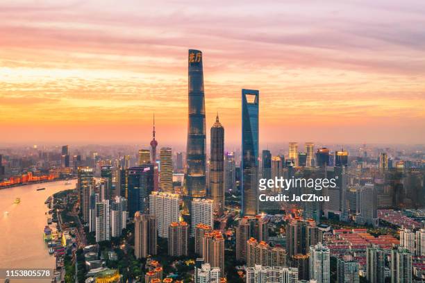aerial view of shanghai city skyline at dusk - shanghai imagens e fotografias de stock