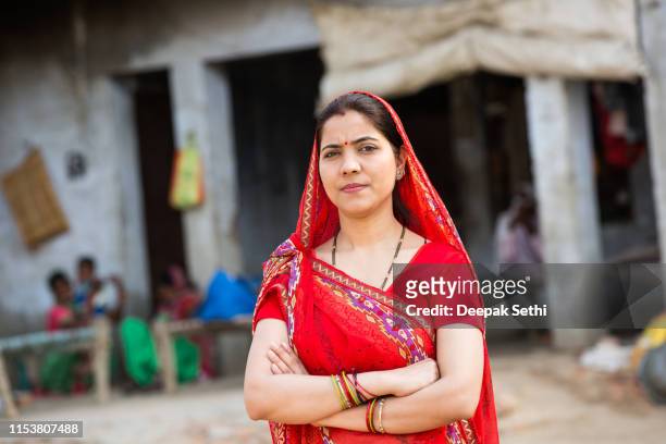 indian woman - stock image - village stock pictures, royalty-free photos & images