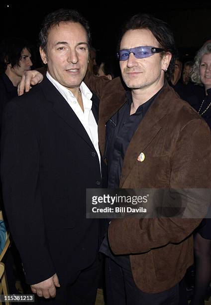 Bruce Springsteen and Bono during 15th Annual Nordoff-Robbins Silver Clef Award Dinner and Auction at Roseland Ballroom in New York City, New York,...