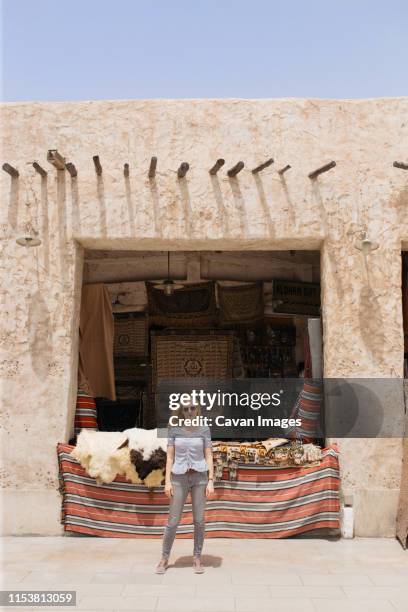 young woman at the doha souq waqif - qatar people stock pictures, royalty-free photos & images