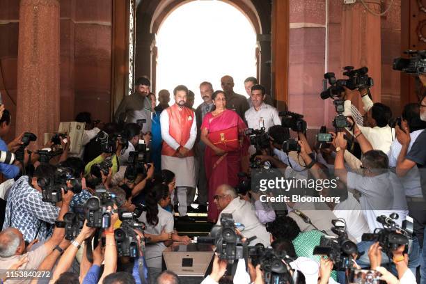Nirmala Sitharaman, India's finance minister, center right, Anurag Thakur, India's finance and corporate affairs minister, center left, and other...