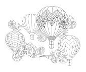 hot air balloon in doodle inspired doodle style isolated on white.