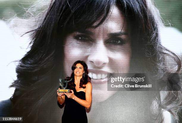 Former Argentine Grand Slam winner, Gabriela Sabatini accepts the Philippe Chattier award during the ITF World Championships Dinner during Day ten of...