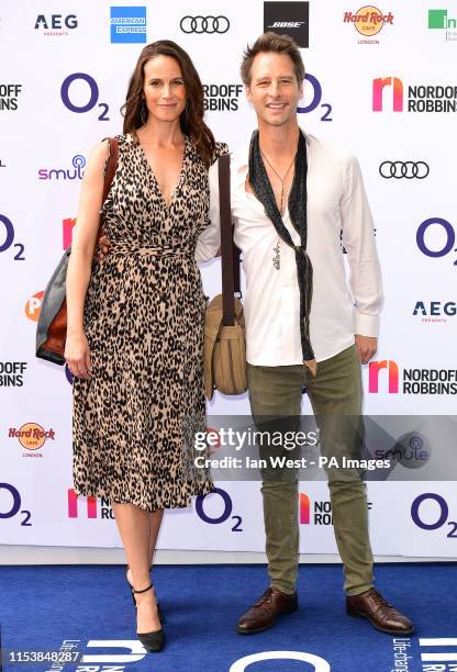 Kristina Hawkes and Chesney Hawkes attending the O2 Silver Clef Awards at the Grosvenor House Hotel, London.