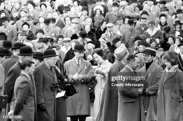 Queen Elizabeth The Queen Mother with Secretary of State for War John Profumo and his wife Valerie Hobson at Sandown Park Racecourse. 22nd March 1963.