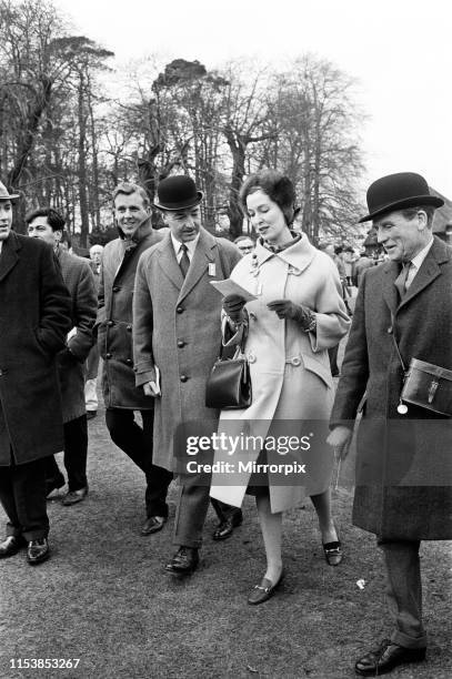 Secretary of State for War John Profumo with his wife Valerie Hobson at Sandown Park Racecourse. 22nd March 1963.